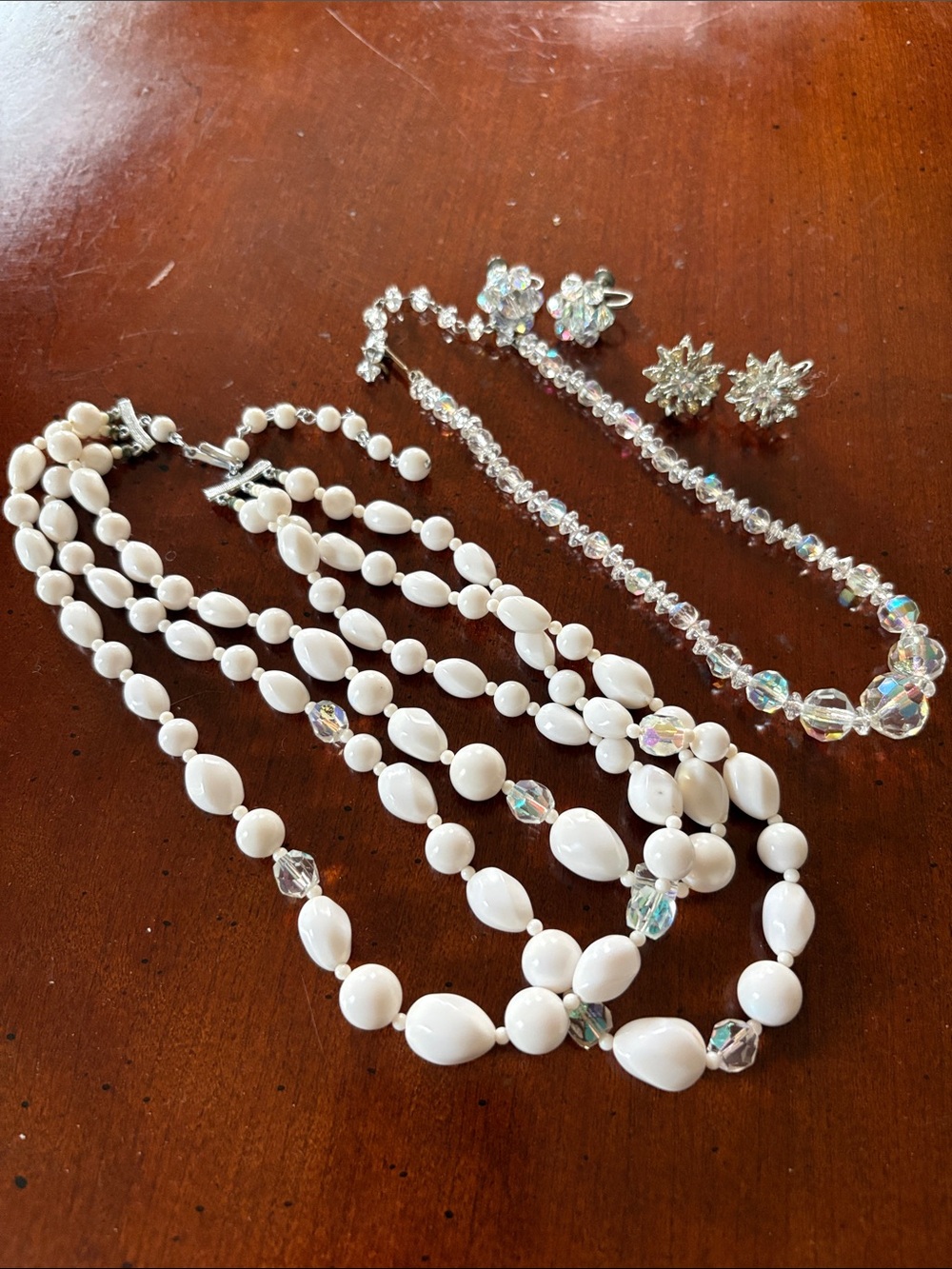 Vintage Aurora Borealis Jewelry Lot. 2 Necklaces 2 sets screw back earrings.